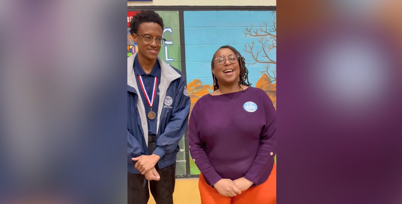 AmeriCorps NCCC graduate from the FEMA Corps program with his mother