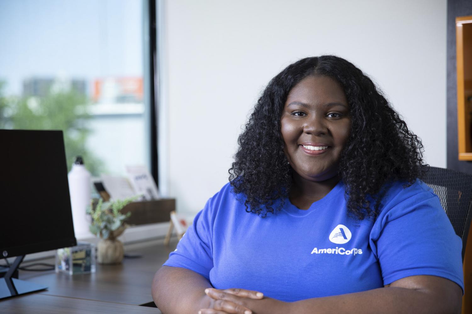 AmeriCorps Member Alexis at her desk