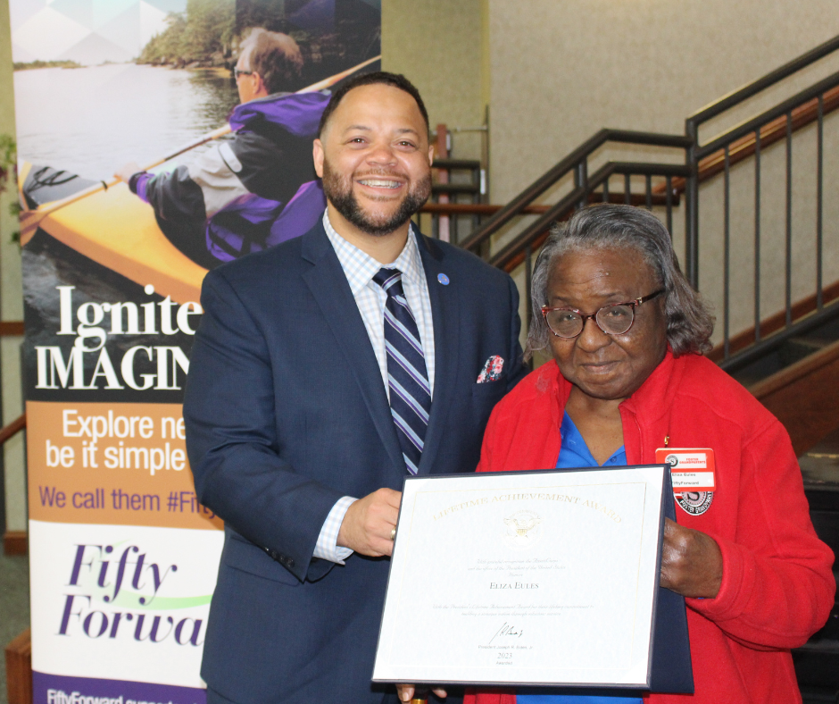 CEO Smith Presenting Grandma Eliza with the President's Lifetime Service Award