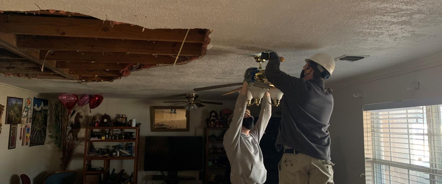 AmeriCorps NCCC members repair a storm-impacted house in Houston. 