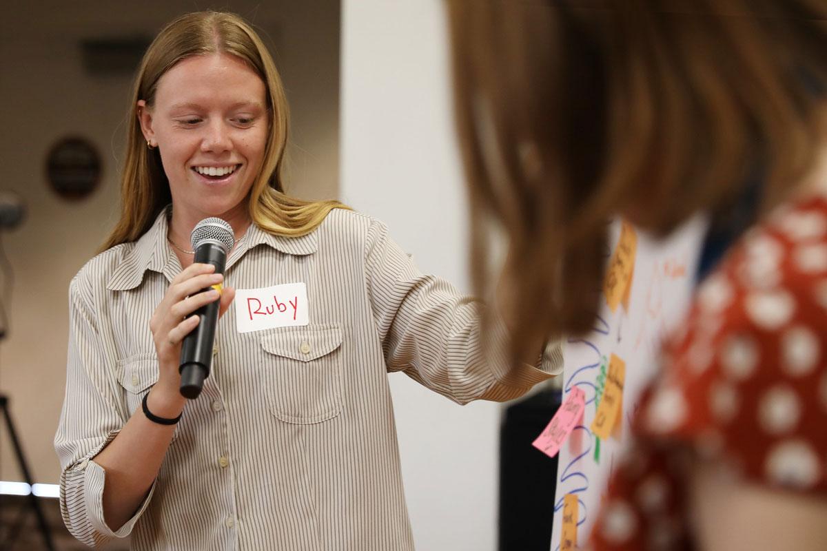 Public Health AmeriCorps member speaking at a symposium